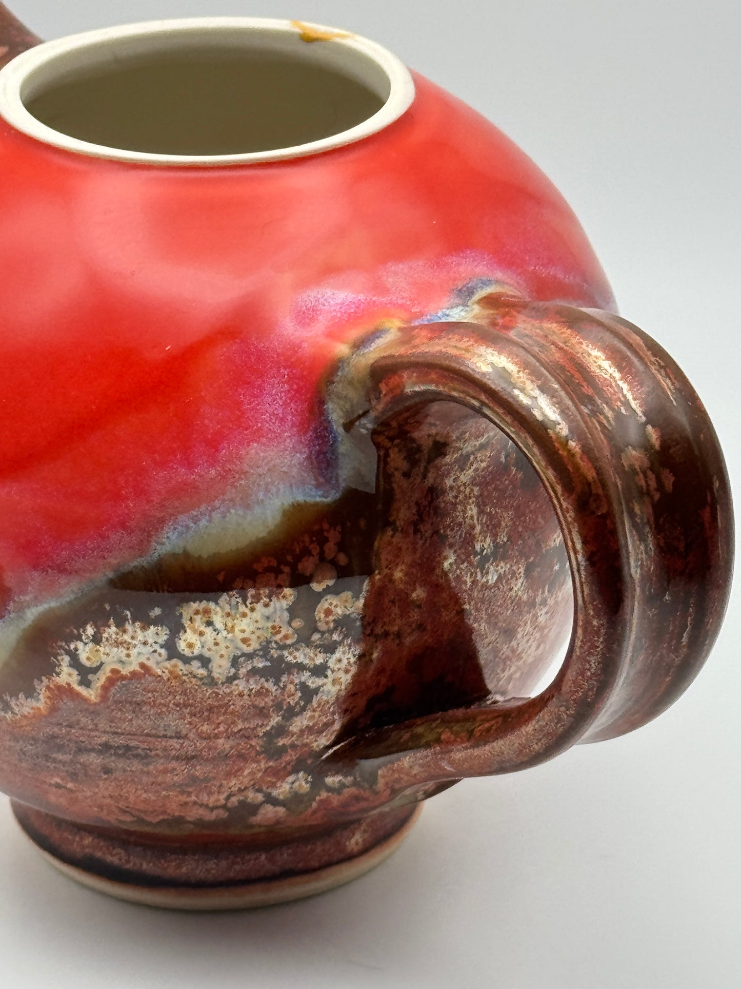 Round red teapot