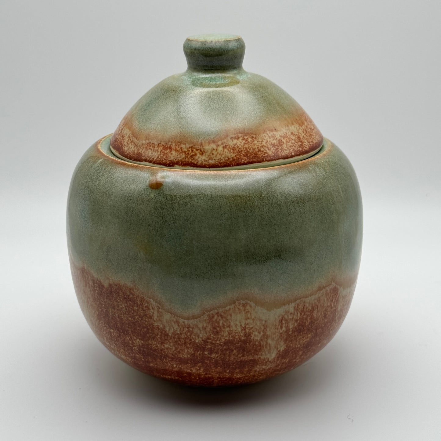 Green lidded jar