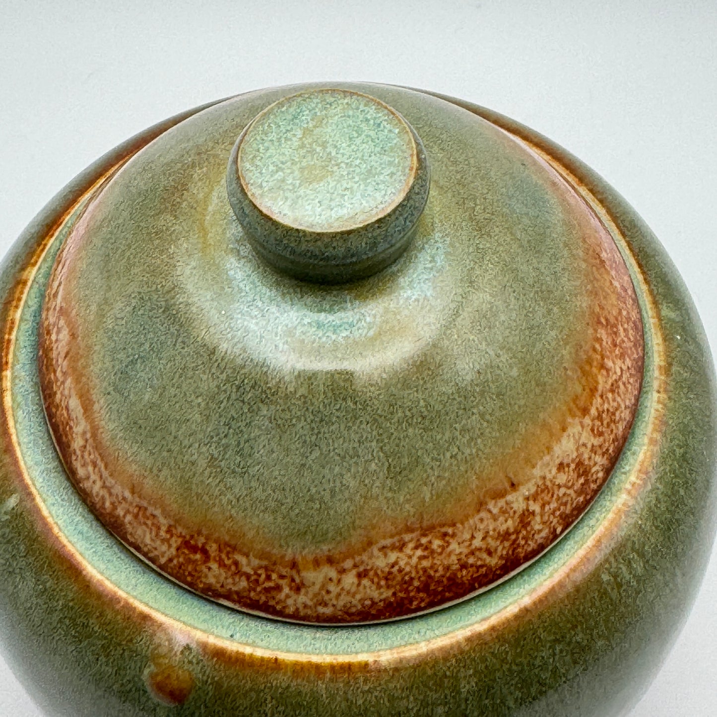 Green lidded jar