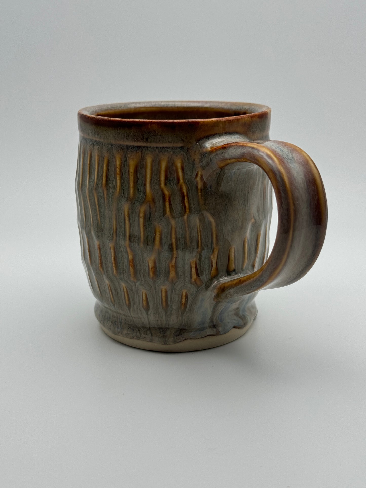 Carved bellied mug