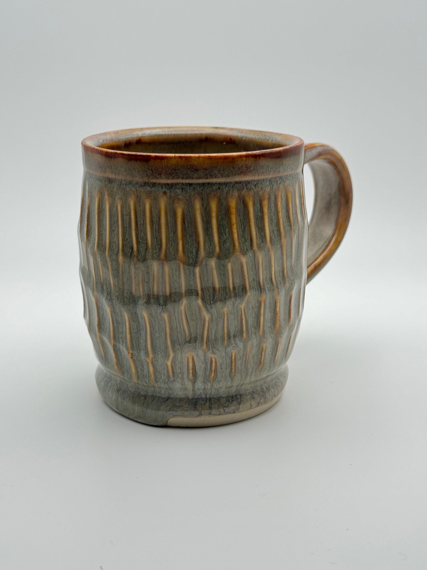 Carved bellied mug