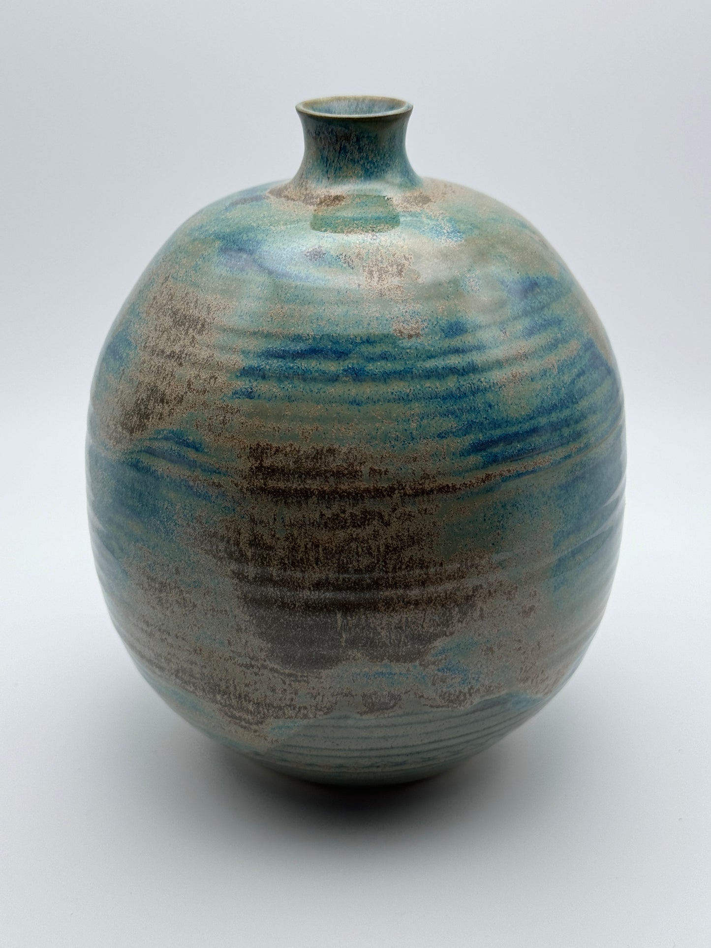 Rusty and glaucous round vase