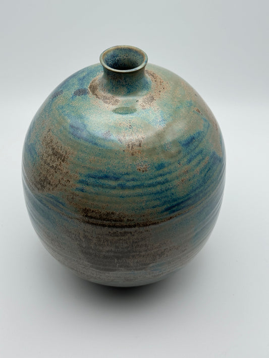 Rusty and glaucous round vase