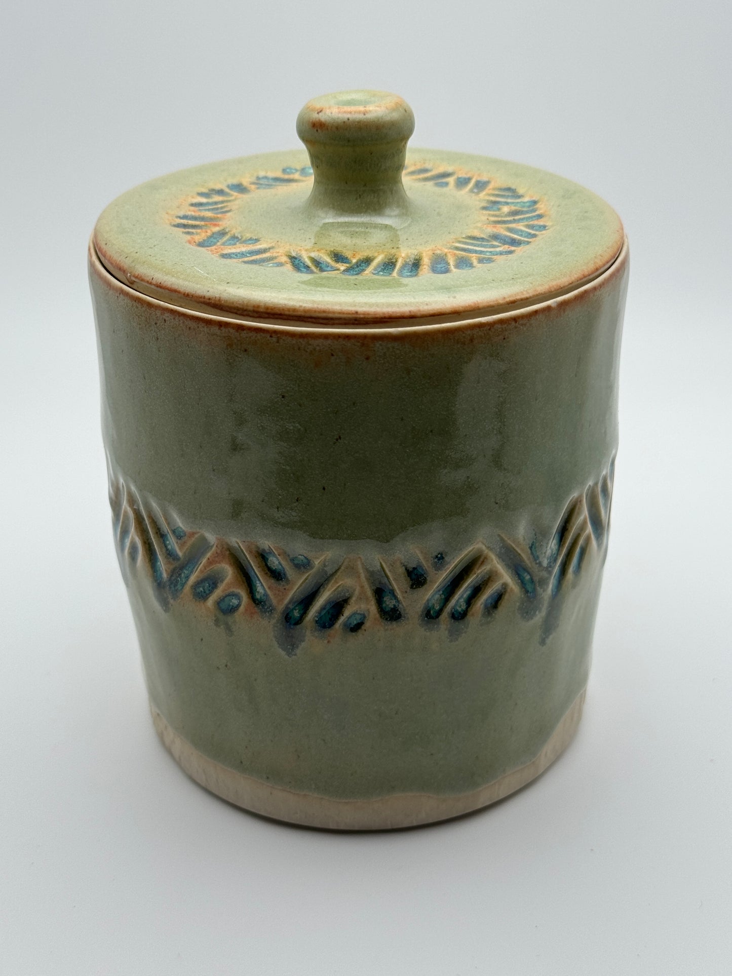 Green carved lidded jar