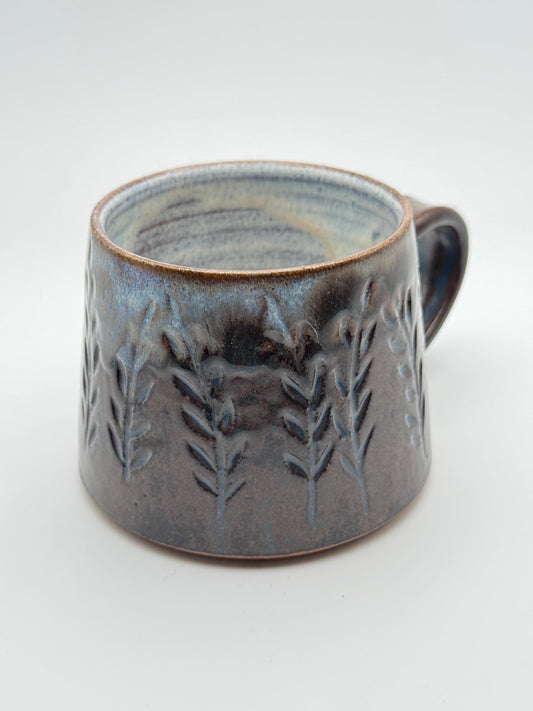 Açai mug carved with botanical motifs