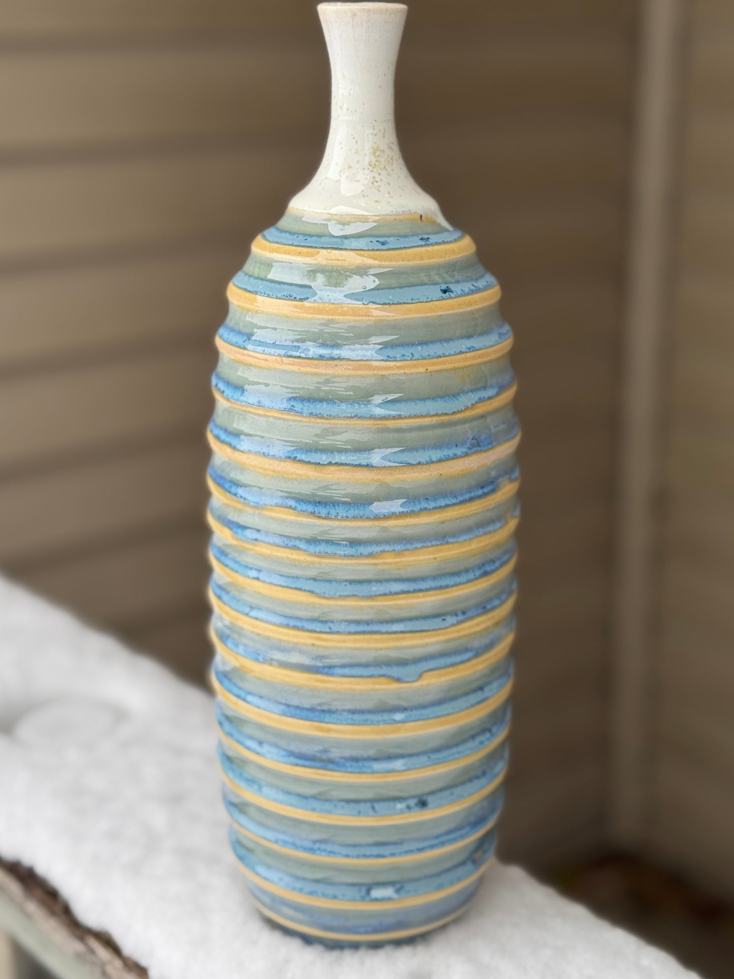 Narrow necked carved vase