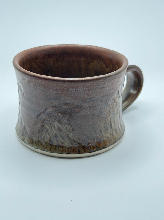 Carved copper mug