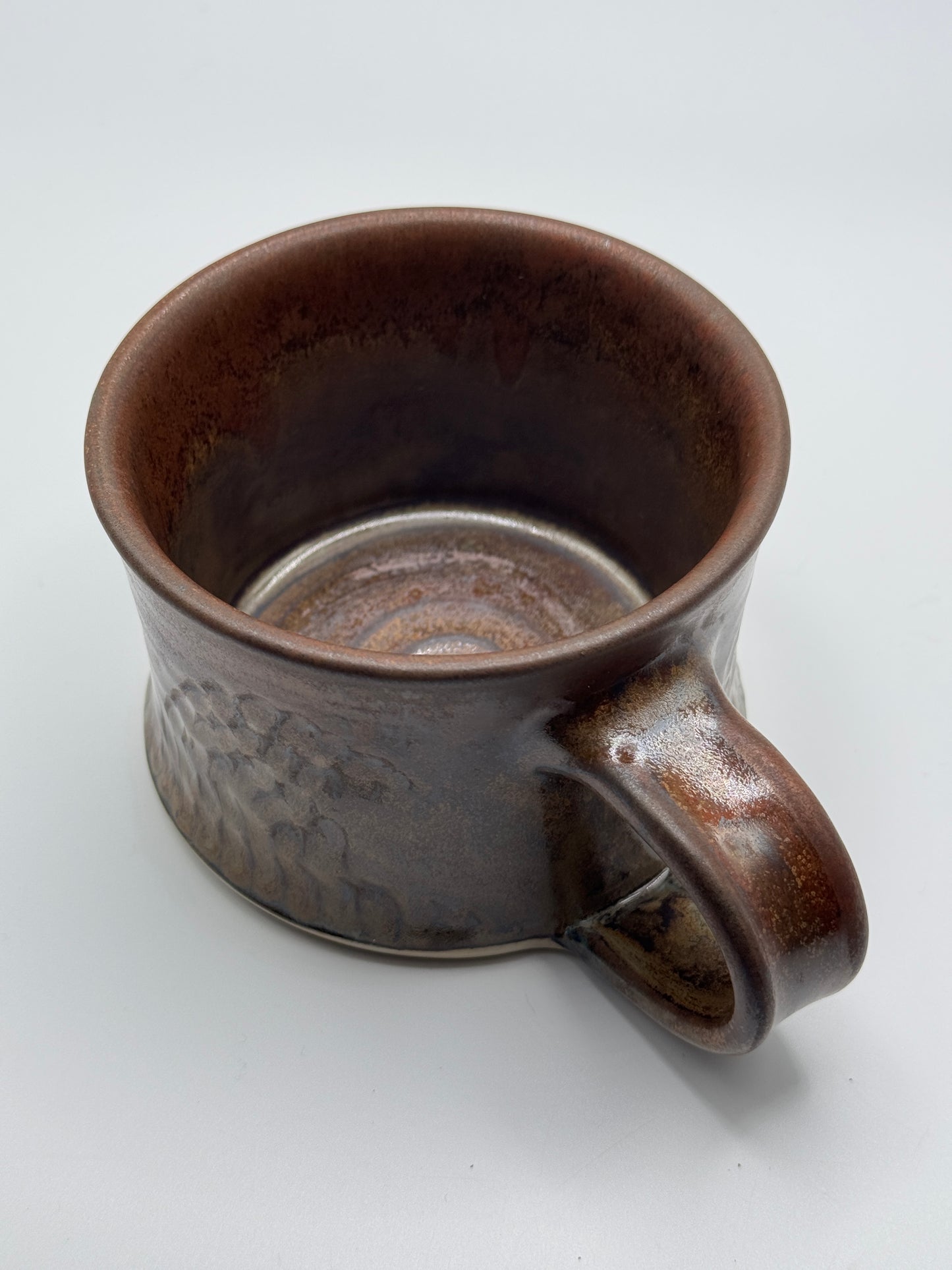 Carved copper mug